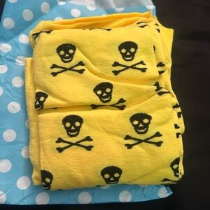 Yellow with black skulls Print Tights